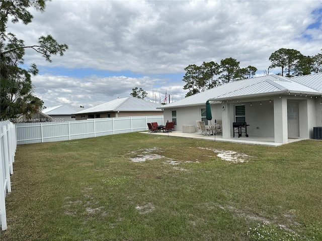 view of yard featuring a patio area and cooling unit