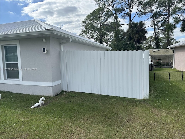 view of property exterior featuring a yard