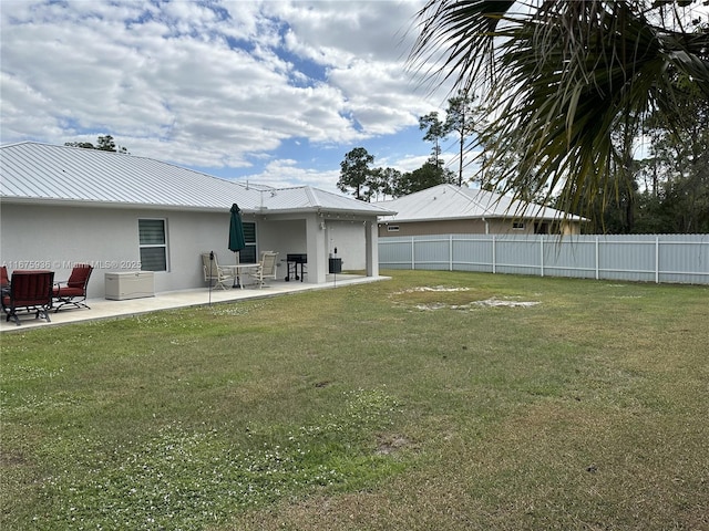 view of yard with a patio area