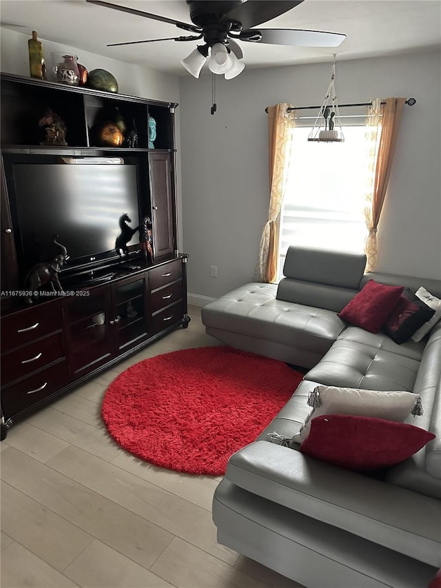 living room with ceiling fan