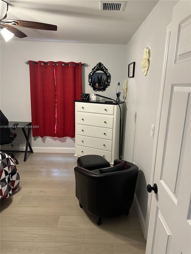 interior space featuring ceiling fan and light hardwood / wood-style flooring