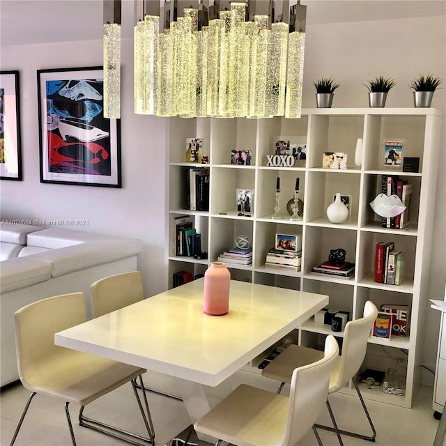 dining area featuring light tile patterned flooring