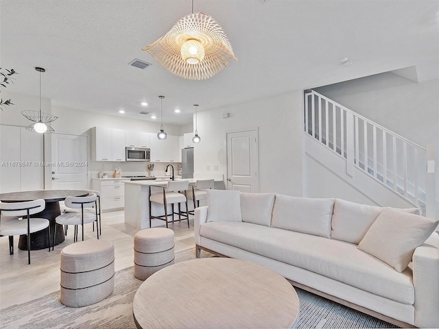 living room with sink