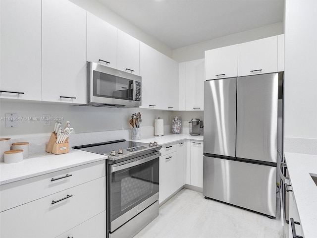 kitchen with white cabinets and stainless steel appliances