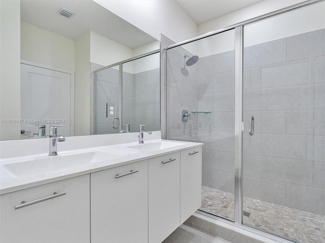 bathroom featuring vanity and walk in shower