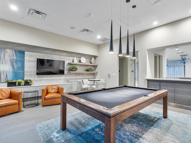 rec room with light hardwood / wood-style floors and pool table