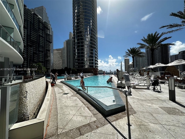 view of swimming pool featuring a patio