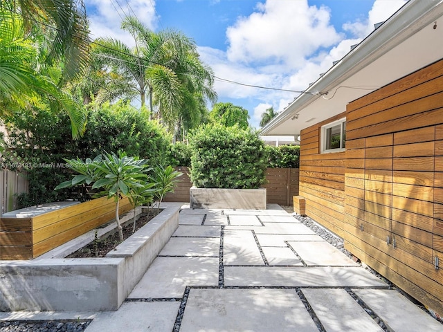 view of patio / terrace with fence