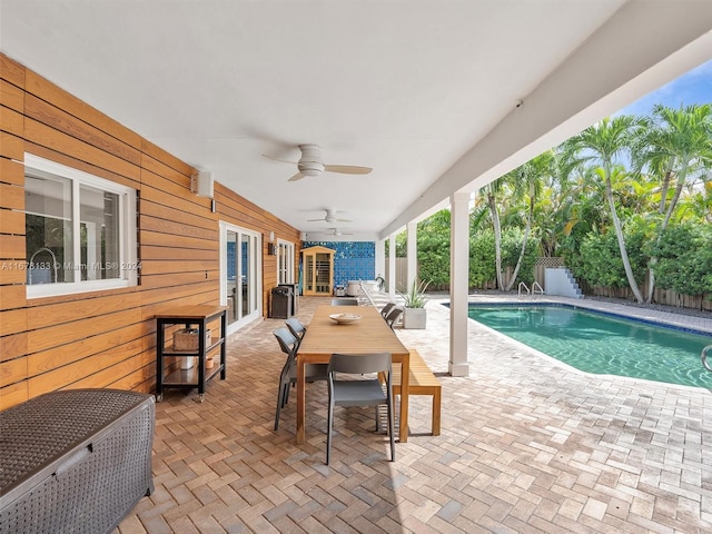 view of pool featuring a patio area, french doors, and ceiling fan