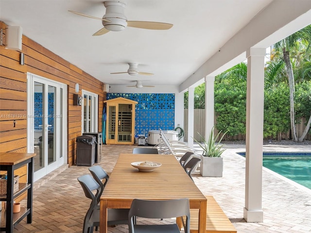 view of patio / terrace with french doors and ceiling fan