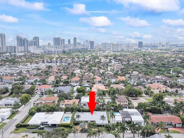 birds eye view of property with a city view