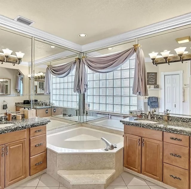 bathroom with a relaxing tiled tub, a healthy amount of sunlight, tile patterned floors, and crown molding