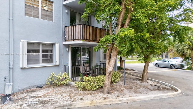 exterior space featuring a balcony