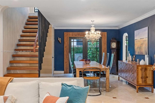 dining space featuring ornamental molding and a notable chandelier