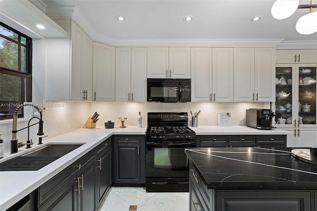 kitchen featuring white cabinets, tasteful backsplash, black appliances, crown molding, and sink