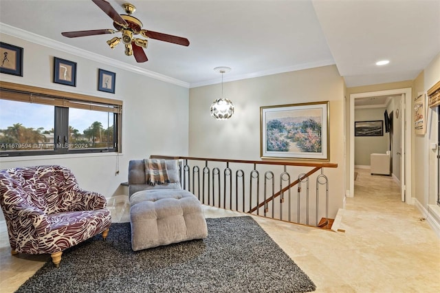 living area featuring crown molding