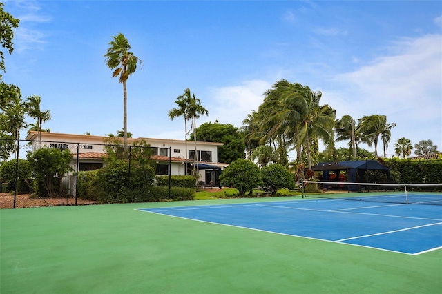 view of sport court featuring basketball hoop