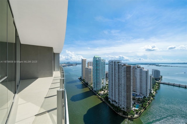 balcony featuring a water view