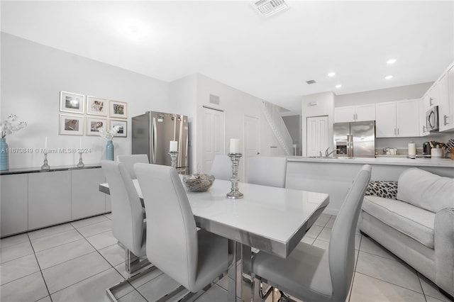 dining room with light tile patterned floors