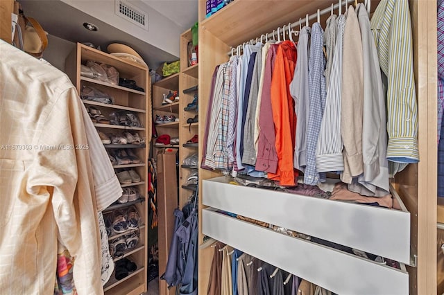 walk in closet featuring visible vents