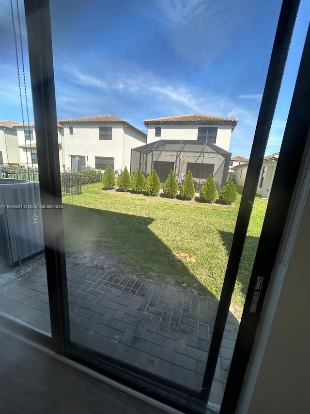 exterior space featuring brick floor and a residential view