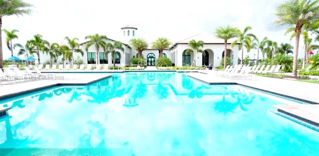 pool featuring a patio area