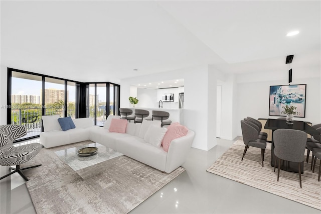 living room with floor to ceiling windows