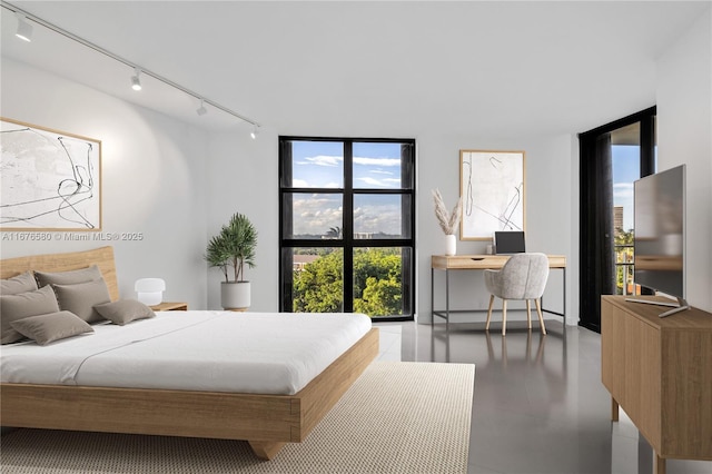 bedroom with a wall of windows