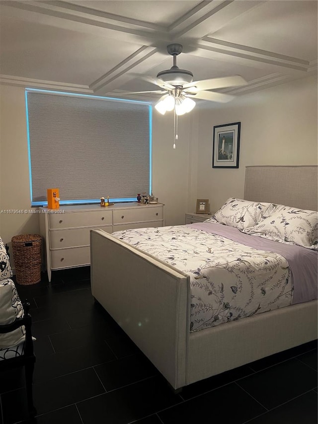 bedroom featuring dark tile patterned floors and ceiling fan