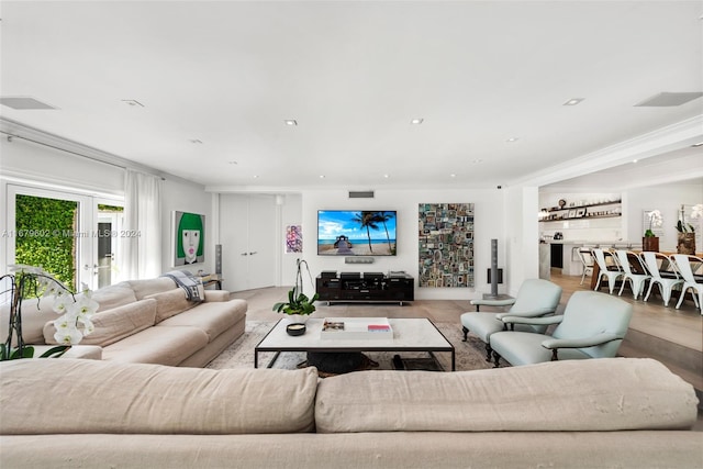 living room with crown molding