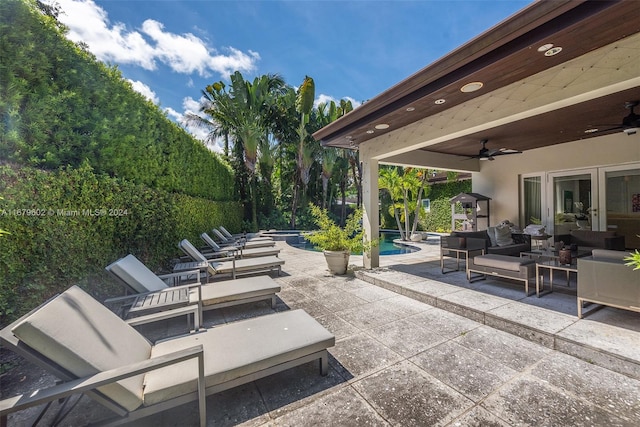 view of patio with an outdoor hangout area and ceiling fan