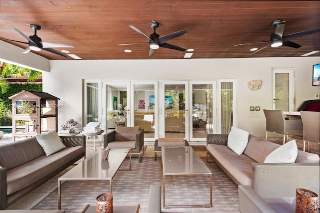 view of patio with french doors, outdoor lounge area, and ceiling fan