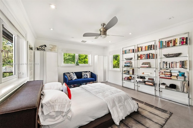 bedroom with ceiling fan and ornamental molding