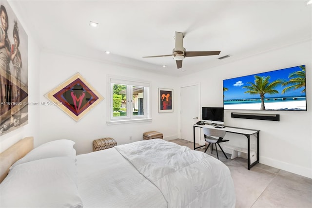 bedroom with ornamental molding and ceiling fan