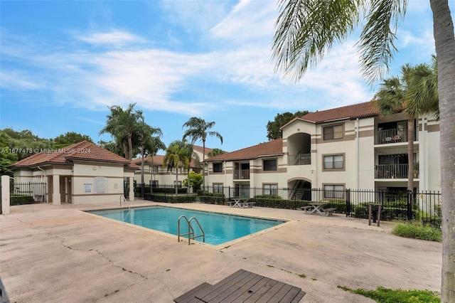 view of pool with a patio area