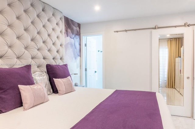 bedroom with a barn door