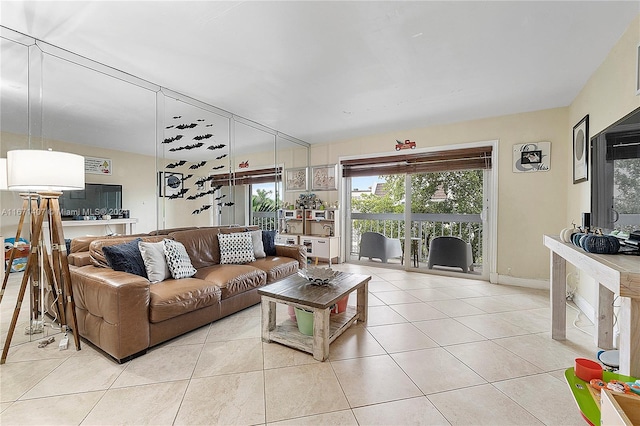 living room with light tile patterned flooring