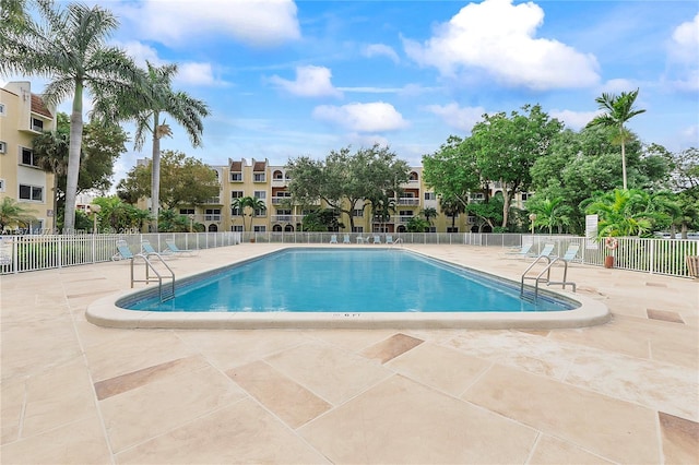 view of swimming pool featuring a patio