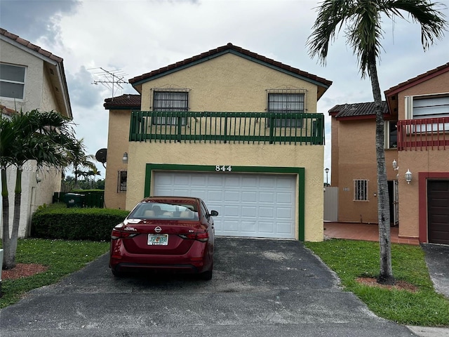 view of front of property featuring a garage