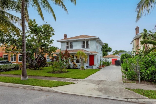 view of front facade with a front yard