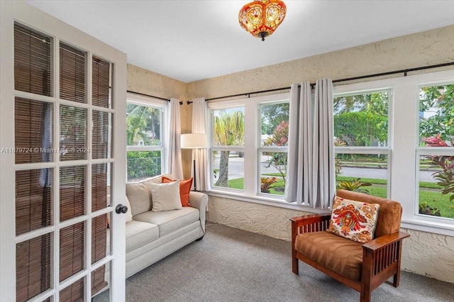 sunroom featuring plenty of natural light