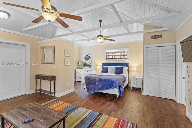 bedroom with dark wood-style flooring, visible vents, lofted ceiling with beams, a ceiling fan, and baseboards