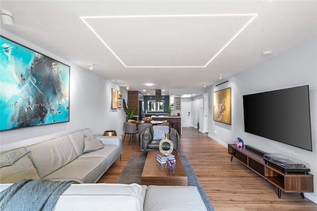 living room with hardwood / wood-style flooring