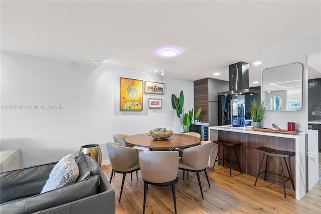 dining room featuring light hardwood / wood-style floors