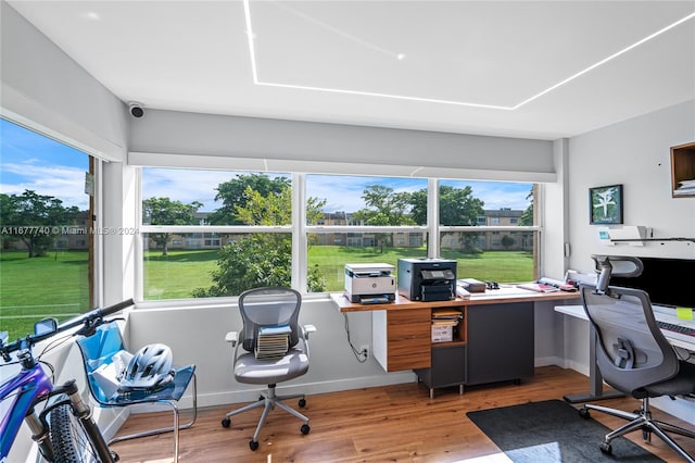 office area with hardwood / wood-style floors