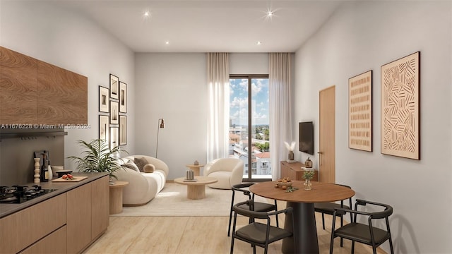 dining space featuring light wood-type flooring