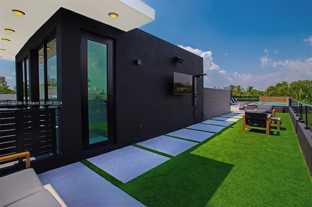 exterior space with a yard