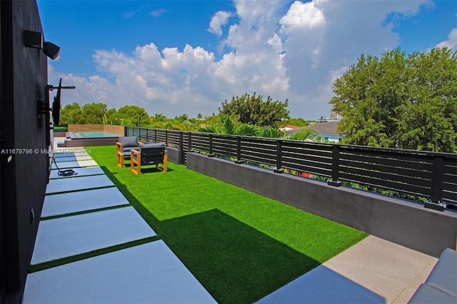 420 SW 15th Rd, Miami, FL 33129 - view of yard featuring a balcony and a pool