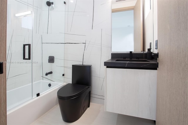 full bathroom with toilet, combined bath / shower with glass door, and vanity