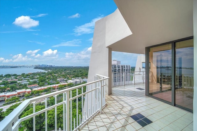 balcony featuring a water view